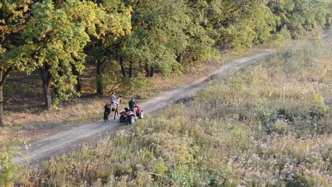 Quad &amp; Horse Stock Footage 97820315