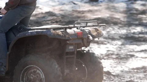 Quad on Mud and Snow IV Stock Footage 128086487