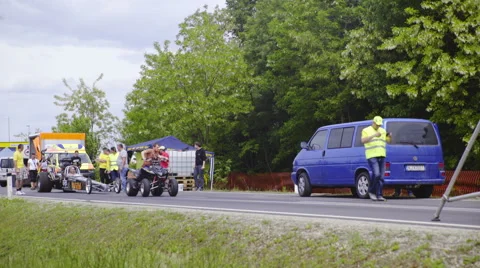Quad pulling Dragster to the racing scene 4K Stock Footage 54961039