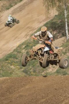 Quad racer is jumping Stock Photos
