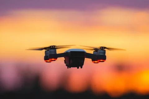 The quadcopter on the background of a sunset Stock Photos