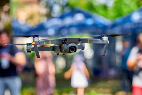 Quadcopter dorone hovering low to the ground Stock Photos