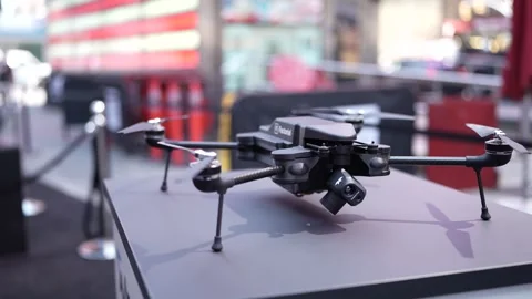 Quadcopter drone on display at technology event Stock Footage 339303209