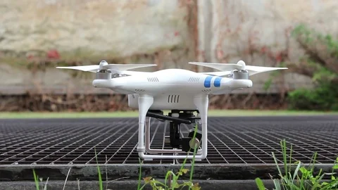 Quadcopter drone engines start Stock Footage 69872558