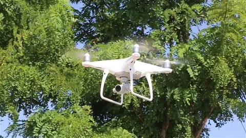 Quadcopter drone flying Stock Footage 79682166