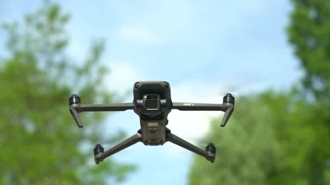 Quadcopter (drone) flying In Mid Air Stock Footage 242338484
