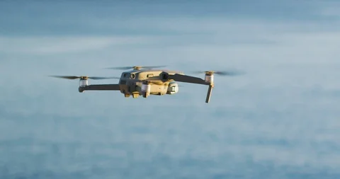 Quadcopter drone flying over the ocean Stock Video Pond5