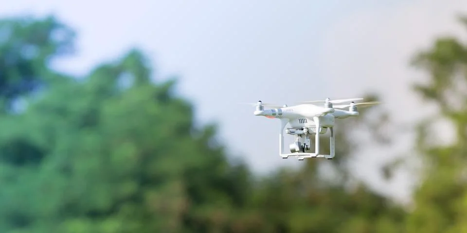 Quadcopter drone flying Stock Photos