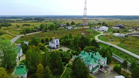Quadcopter flies over the territory of the monastery Stock Footage 160058808
