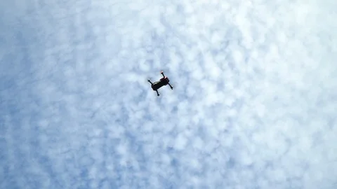 The quadcopter flies through the air. Flight drone. Stock Footage 96481198