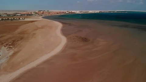 Quadcopter flight over the Red Sea. Low tide. Sand. Desert. Stock-Footage 131229583