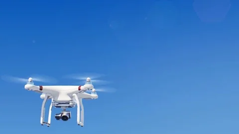Quadcopter Flying in the Blue Sky and Filming all Around with its Camera. Modern 動画素材 81737005