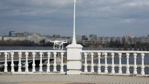 Quadcopter flying in the city Stock Footage 72777155