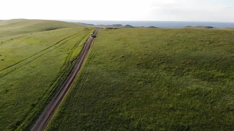 The quadcopter follows the car Video stock 171762953