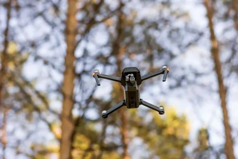 Quadcopter in the forest Stock Photos