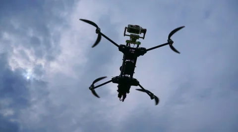 Quadcopter rises up against the sky. View from the bottom up 動画素材 38298511