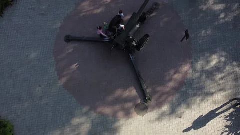 The quadcopter rises and shows the Soviet military equipment in the park Stock Footage 145057172
