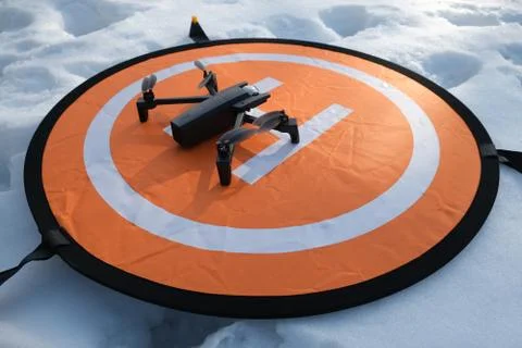 Quadcopter is on the take-off lap. Stock Photos