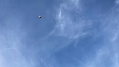 A quadrocopter drone going down- Stock Footage 71120847