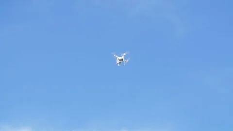 Quadrocopter flies against the sky Stock Footage 80418006