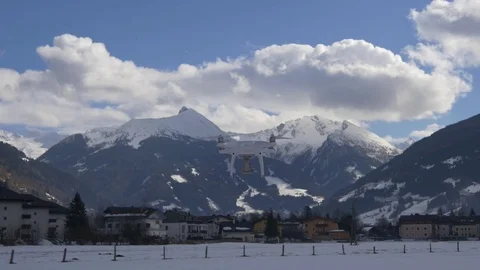 Quadrocopter flies to mountains Stock Footage 72747002