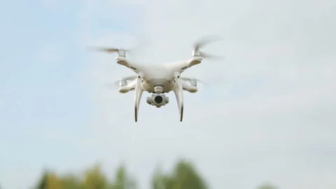 Quadrocopter flies into the sky Stock Footage 99215820