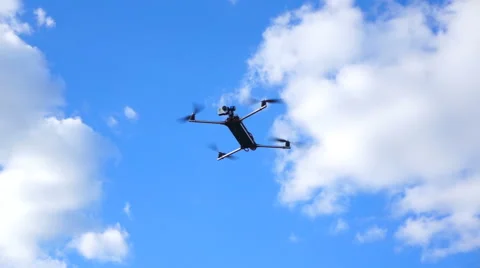 Quadrocopter in flight against the sky Stock Footage 54609968