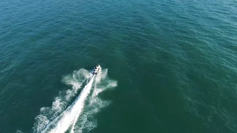 Quadrocopter flight for aquabike Stock Footage 98274112