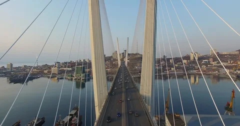 Quadrocopter flight between cable-stayed pylons Stock Footage 98274298