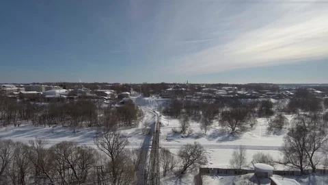 Quadrocopter flight over a cable-stayed bridge and a frozen river Stock Footage 101630854