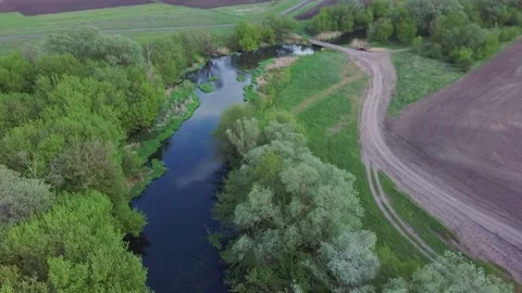 Quadrocopter flight russian river bridge over the river Video stock 131272183