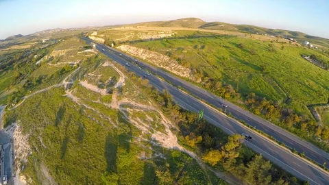Quadrocopter flying along highway, filming fascinating landscapes of Cyprus Stock Footage
