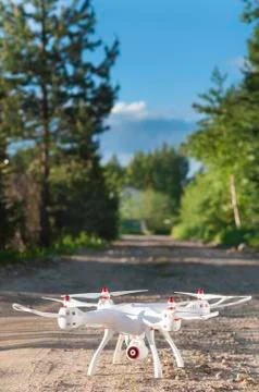 Quadrocopter on the road Stock Photos