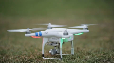 Quadrocopter soars up on a green background Video stock 58195406