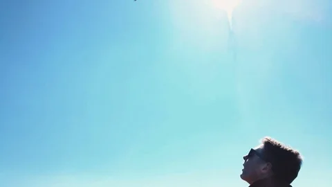 Quadrocopter takes off from the pilot's hand in slow motion. Running the Dron. Stock Footage 74413092