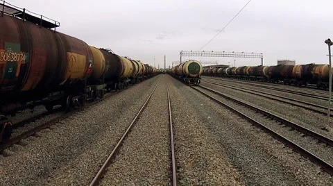 Quadrocopters flying between two trains trains Video stock 64895856