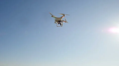 Quadrocopters flying in the sky Видео 62957855