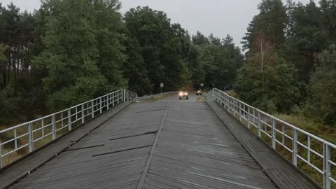 Quads driving over the bridge. Stock Footage 297564561