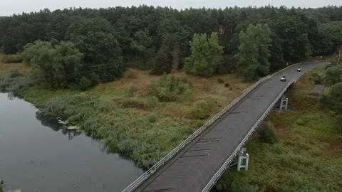 Quads driving over the bridge. Stock Footage 297564762