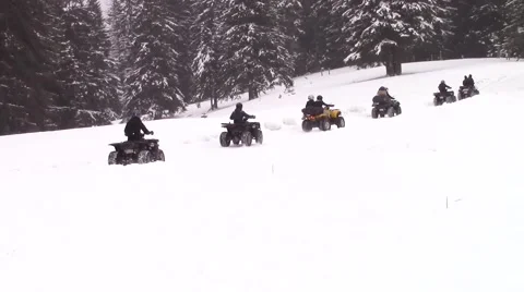 Quads on snow trail Video stock 46743919