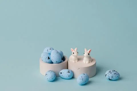 Quail blue easter eggs on blue background. Minimal comcept with copy space Stockfoto's