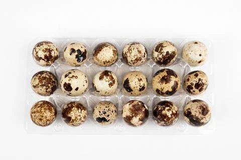 Quail egg pack on a white background. Healthy, breakfast and poultry concept Stock Photos