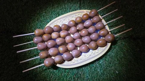 Quail egg satay Stock Photos