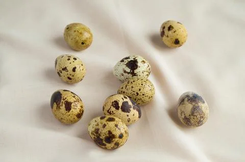 Quail eggs are on the table, the Concept of Easter and a healthy diet Stock Photos