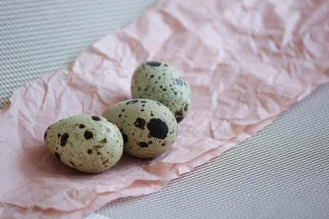 Quail eggs. Background is decorative. Stock Photos