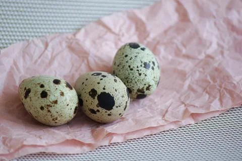 Quail eggs. Background is decorative. Stock Photos