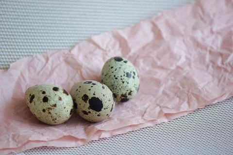 Quail eggs. Background is decorative. Stock Photos
