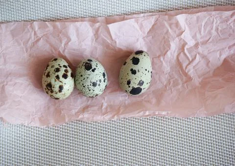 Quail eggs. Background is decorative. Stock Photos