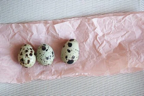 Quail eggs. Background is decorative. Stock Photos