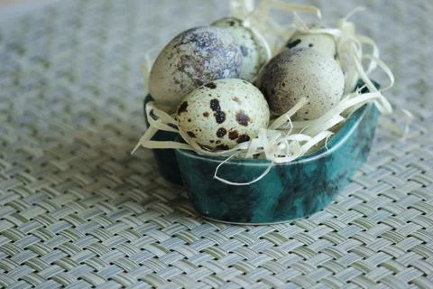 Quail eggs. Background is decorative. Stock Photos